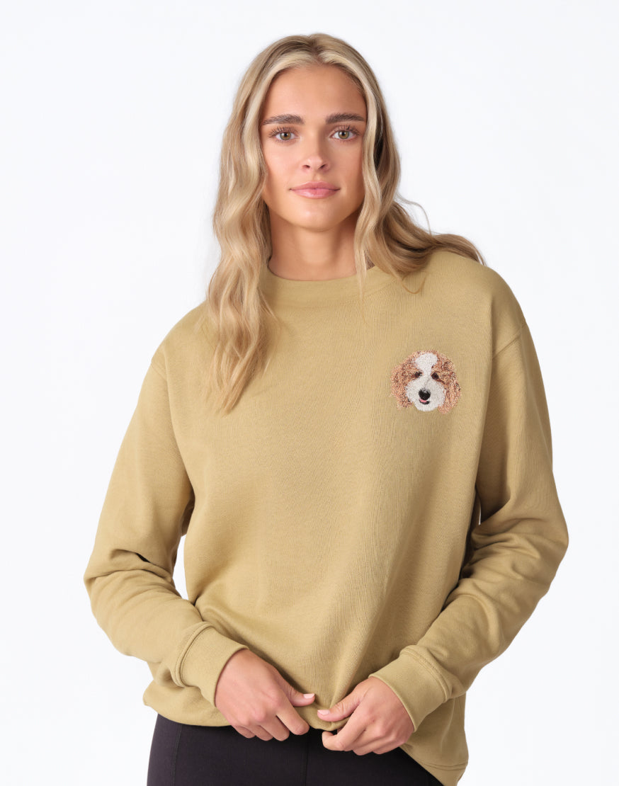 Model wearing a PawCheri embroidered crewneck