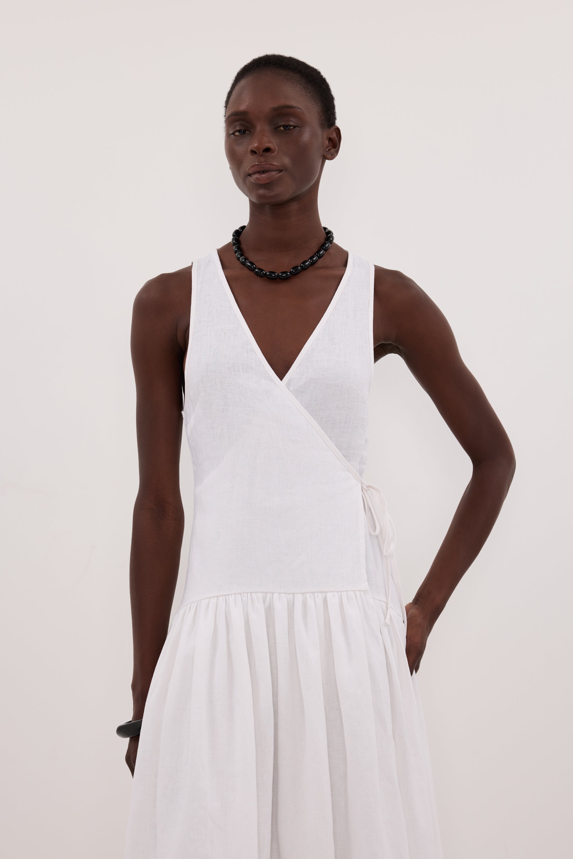 ILIO WHITE SLEEVELESS LINEN WRAP MIDI DRESS