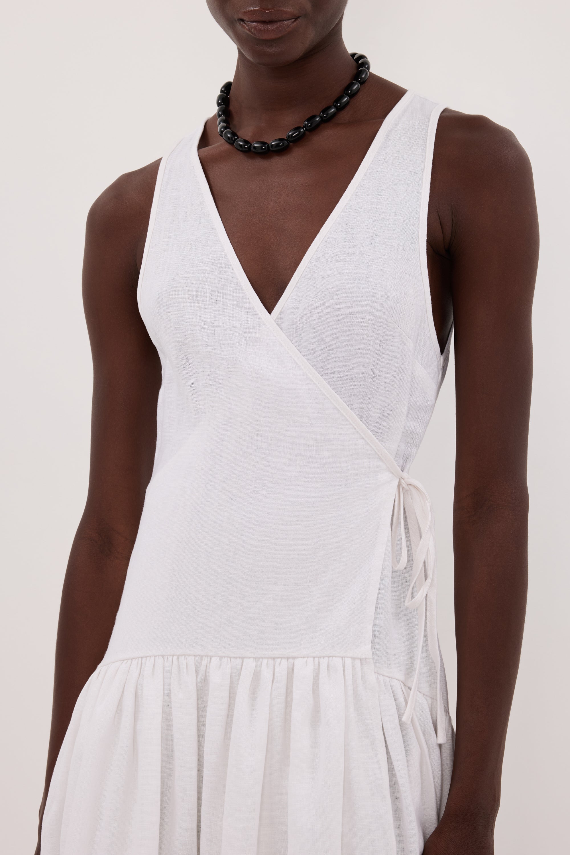 ILIO WHITE SLEEVELESS LINEN WRAP MIDI DRESS